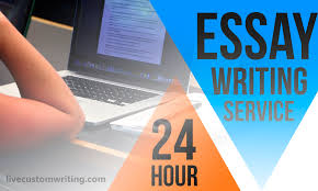“Essay writing service advertisement featuring laptop workspace and 24-hour academic support.”