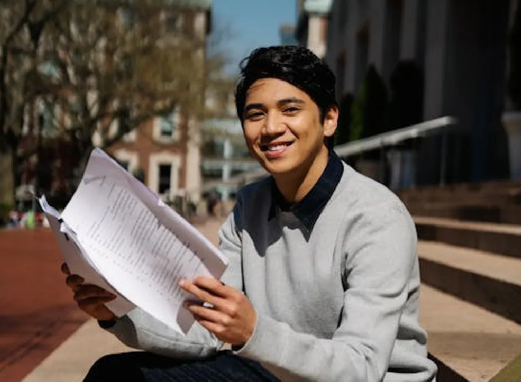 A student proofreading his paper.